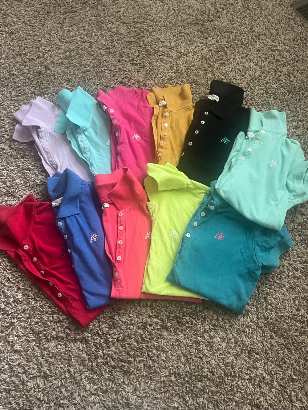 Women’s size medium Aeropastle polos. Lot of 11